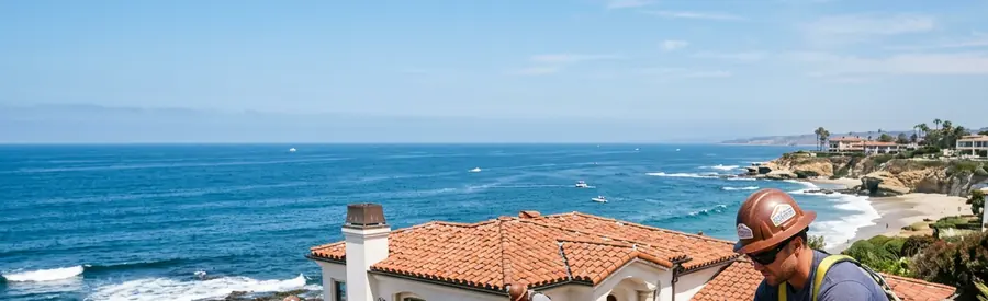 Rooftops and the coastline seen from a roof in ${PLACE}